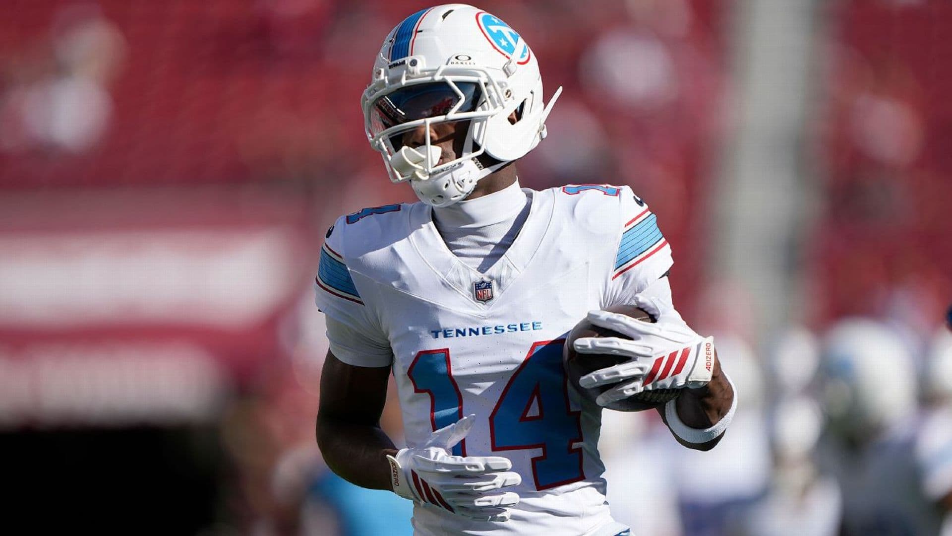 Carnell Tate running with the football for the Tennessee Titans